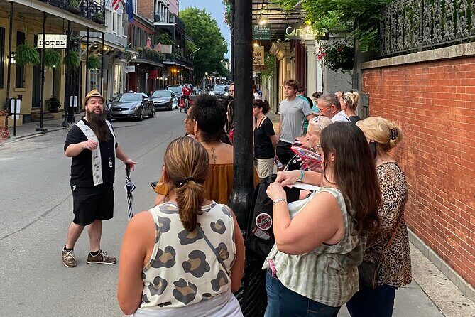 French Quarter Ghost Tour - Bourbon Street at night: the heart of the Big Easy, with darker stories attached