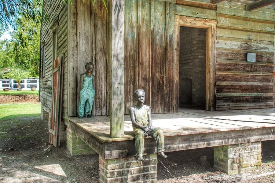 From New Orleans: Whitney Plantation Ticket & Transportation - Riding out of New Orleans: what the Gray Line bus ride adds