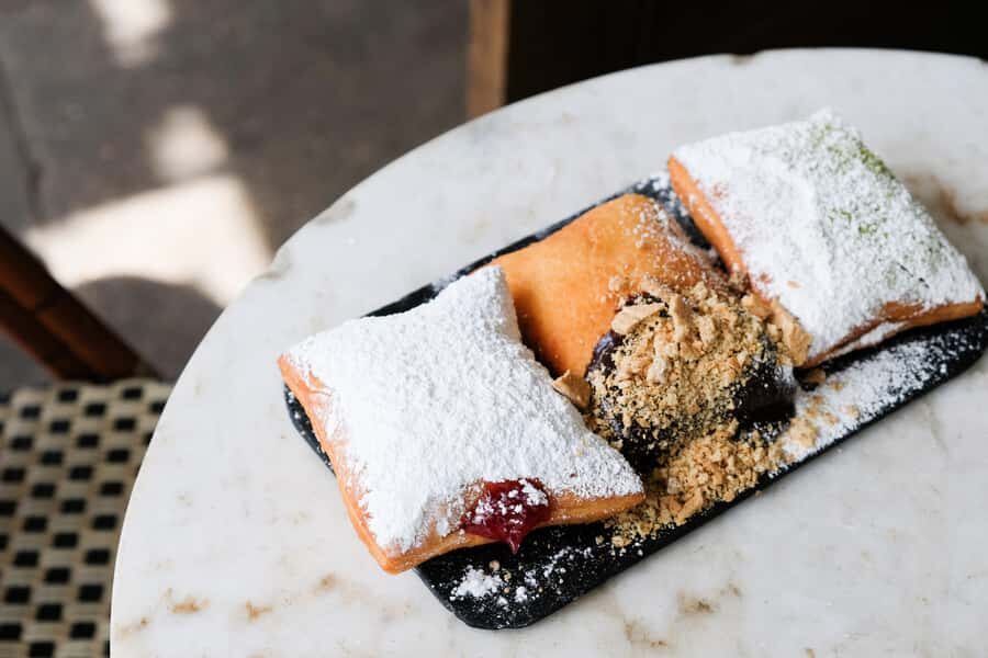 New Orleans: Guided Delicious Beignet Tour with Tastings - A 2-hour donut mission that still feels like a city tour