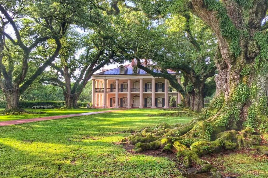 New Orleans: Swamp Boat Ride and Historic Plantation Tour - Oak Alley Plantation: 1839, the quarter-mile oak avenue, and slavery-focused exhibits